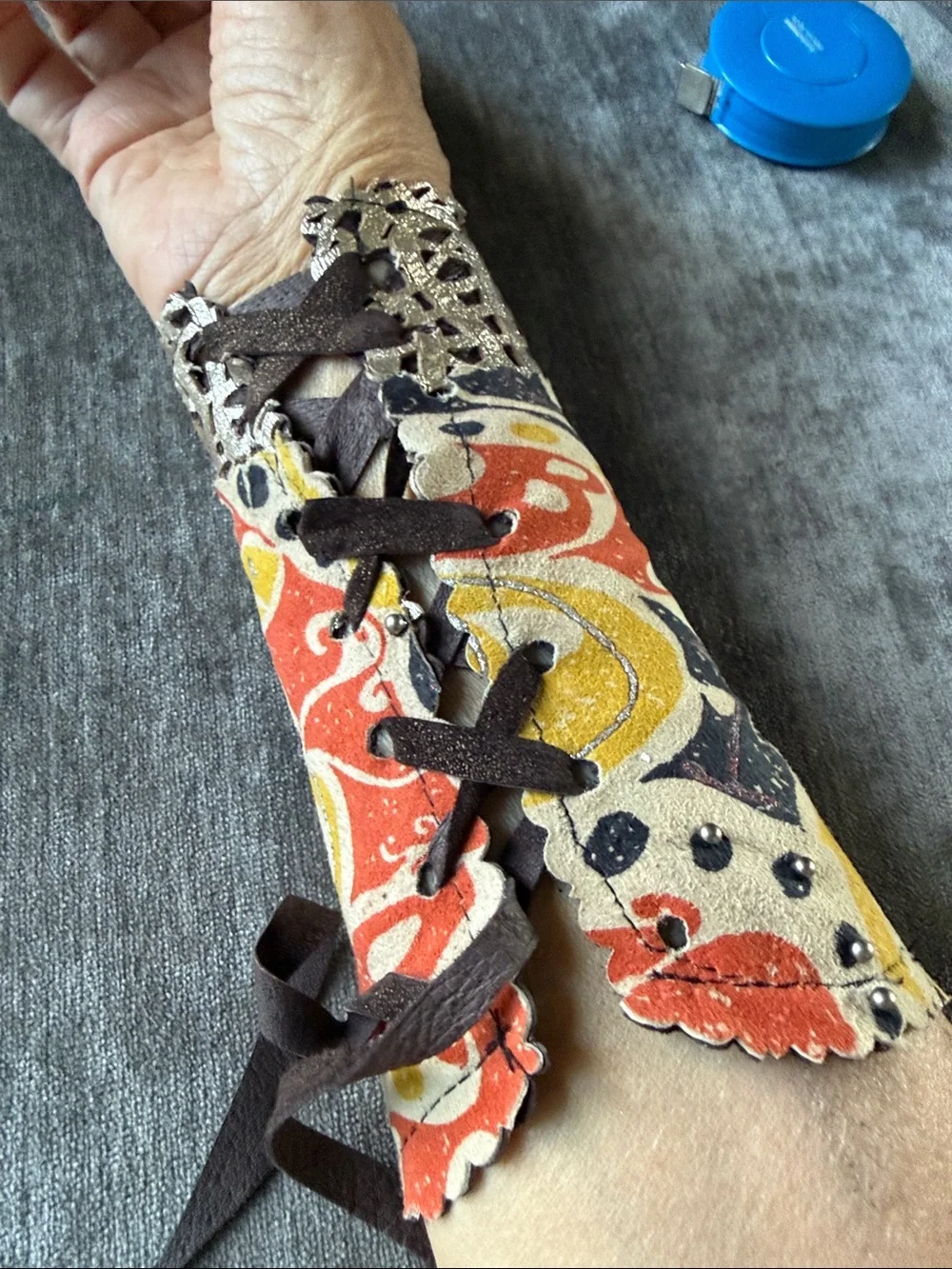 Colorful Printed Leather Wrist Cuff - Multi colour with metal looking studs .